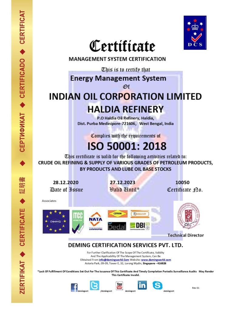 Management System Certificate issued by Deming Certification Services Pvt. Ltd. certifying Indian Oil Corporation Limited Haldia Refinery for Energy Management System compliance under ISO 50001:2018, featuring a vertical gold margin on the left and international accreditation badges along the bottom.
